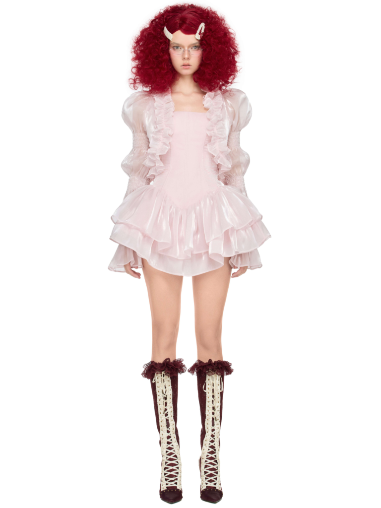 Girl wearing pink shimmer Tinkerbell birthday dress with ruffle jacket, perfect for party or event.
